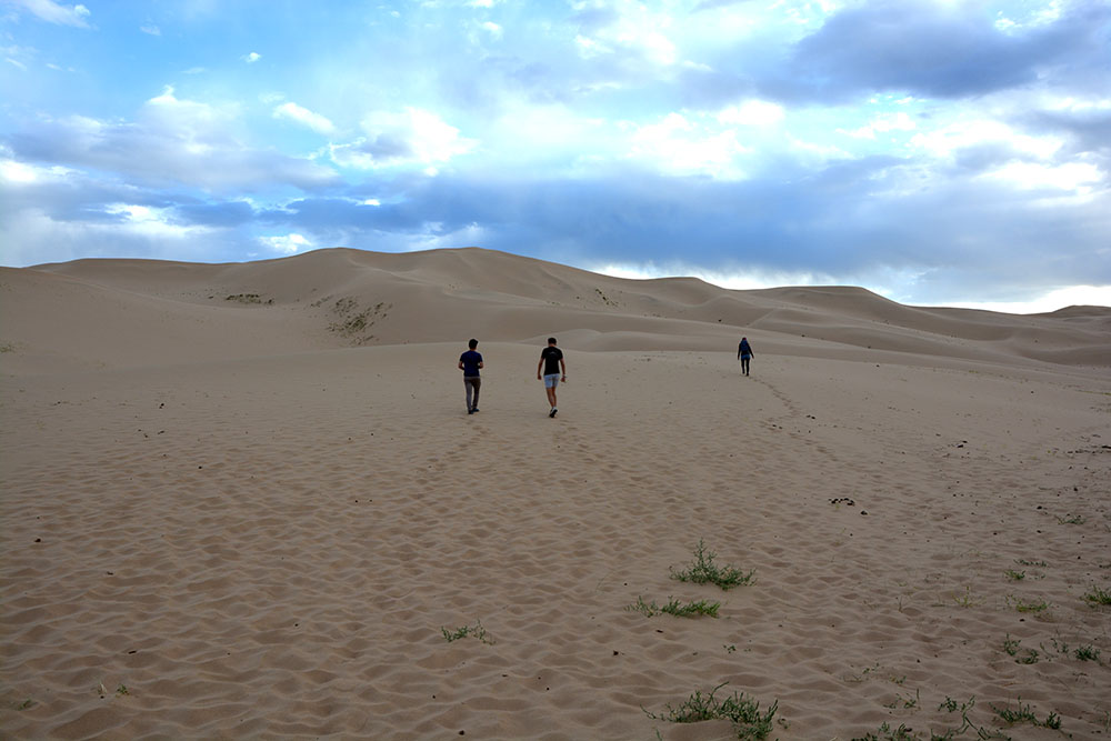 Besteigung einer Sanddüne in der Gobi